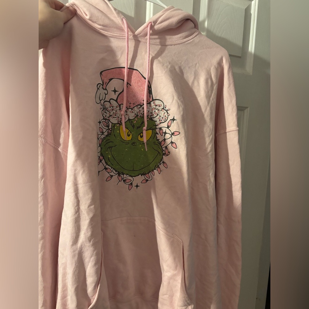 Pink grinch hoodie.